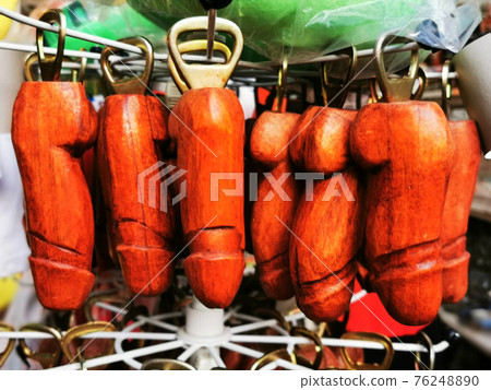 wooden penis openers as universal souvenir 76248890