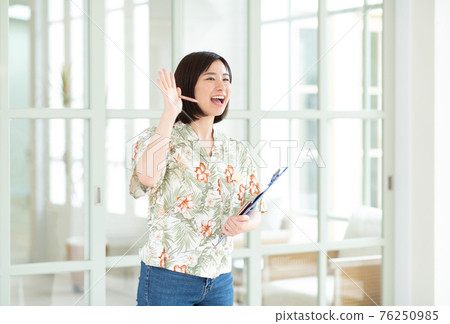 Local staff at the resort hotel 76250985