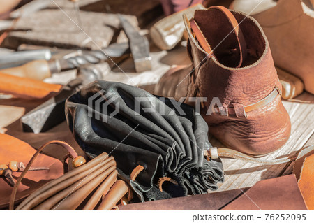 handmade leather shoe and purse bag counter tanner 76252095