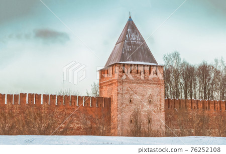 Smolensk January 2015 Russia. Square high brick tower and part of the wall 76252108