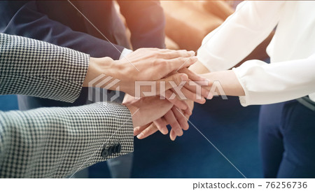 People forming a circle Business success unity 76256736