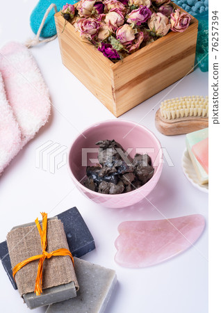 natural   spa set with salt, healing mud and soap on white  background 76257394