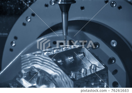 The  5-axis machining center cutting the v8-engine cylinder block.  76261683