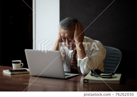 Businessman overtime fatigue worries 76262030