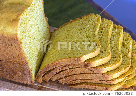 Slices of homemade natural bread ready to be served Slices of homemade natural bread ready to be served 76263028