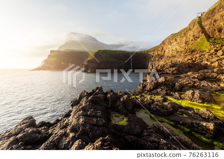Mulafossur waterfall in Gasadalur, Vagar Island of the Faroe Islands. 76263116