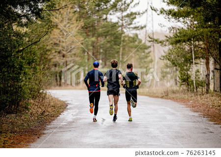 back three male athletes run race back three male athletes run race 76263145