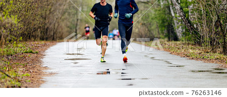 two male runners run race two male runners run race 76263146