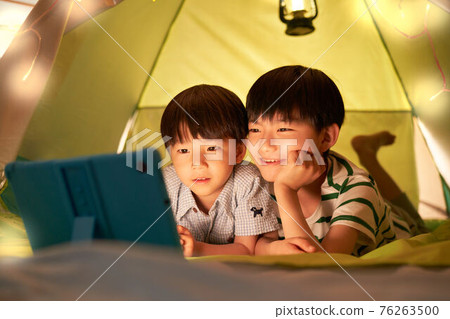 Boys enjoying home camp Boys enjoying home camp 76263500