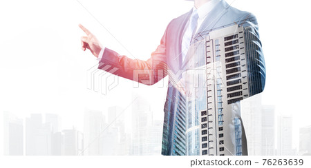 Businessman pointing on empty space 76263639