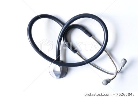 Stethoscope forming a heart on white background Stethoscope forming a heart on white background 76263843