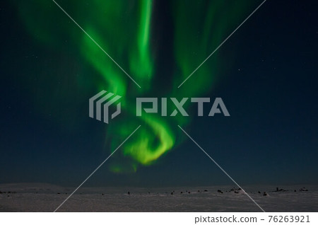 northern light on the silent field before sun rise. northern light on the silent field before sun rise. 76263921