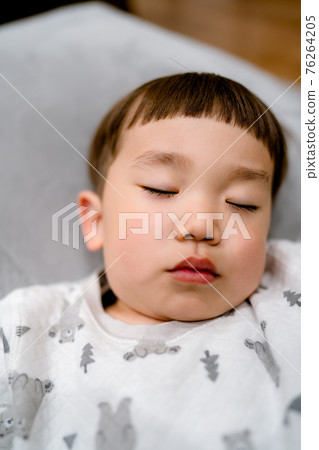 Child's sleeping face Child's sleeping face 76264205