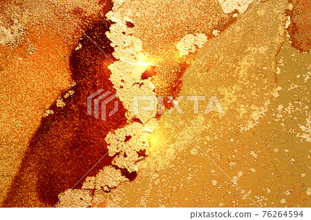 Amber, red and gold shining abstract marble background 76264594