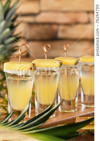 Tropical tequila shots 76264789