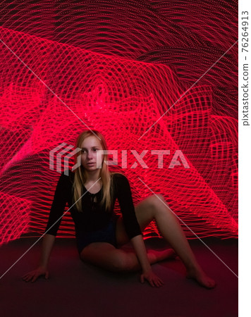 Young Blonde Woman Long Exposure Light Painting Young Blonde Woman Long Exposure Light Painting 76264913