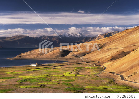 Beautiful mountain range and blue sky at Karzok village and Tso moriri lake in Ladakh region, Jammu and Kashmir, India Beautiful mountain range and blue sky at Karzok village and Tso moriri lake in Ladakh region, Jammu and Kashmir, India 76265595