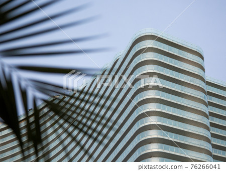 Artistic view of exterior architectural design and details. A modern building. 76266041