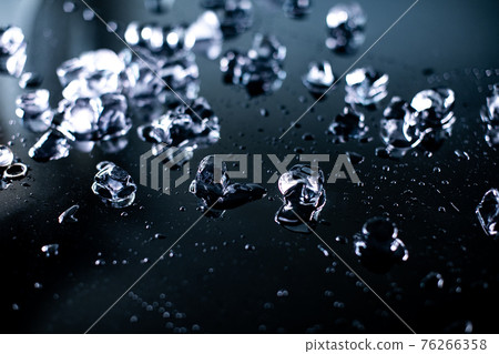 pile of different ice cubes on reflection table on black background pile of different ice cubes on reflection table on black background 76266358