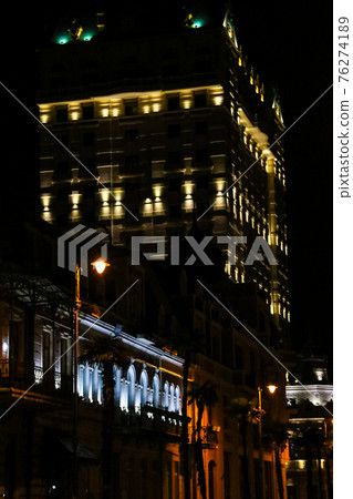 Illuminated Europe Square in Batumi. Night cityscape with modern architecture in Georgia Illuminated Europe Square in Batumi. Night cityscape with modern architecture in Georgia 76274189
