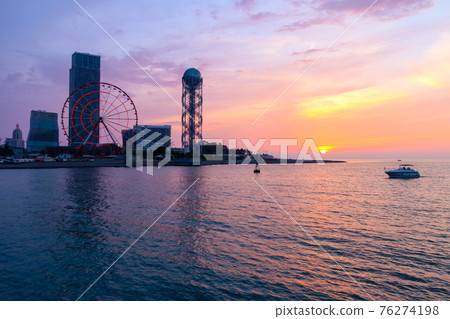 Batumi, Adjara, Georgia. View on the resort city at sunset Batumi, Adjara, Georgia. View on the resort city at sunset 76274198
