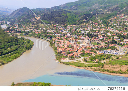 Aerial view on old town Mtskheta and confluence of the rivers Kura and Aragvi in Georgia 76274236