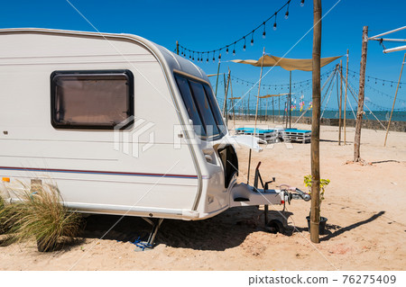 Camper RV car on white beach in summer at Cha-Am Camper RV car on white beach in summer at Cha-Am 76275409