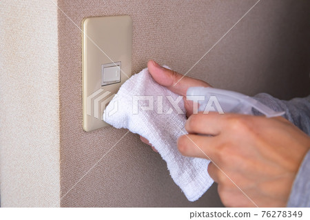 Switch disinfection Hand with a rag and disinfectant [sterilization image] 76278349