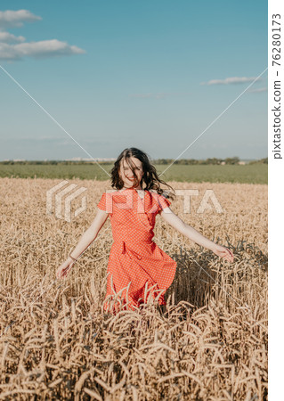 Outdoor Time During Pandemic Helps Wellbeing. Nature Improve Mental Health During Pandemic. Outdoor portrait of young woman on nature background 76280173