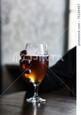 glass of cold light beer 76280467