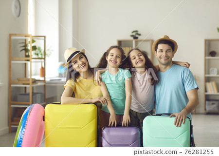 Portrait of happy smiling family with modern suitcases ready for summer vacation Portrait of happy smiling family with modern suitcases ready for summer vacation 76281255