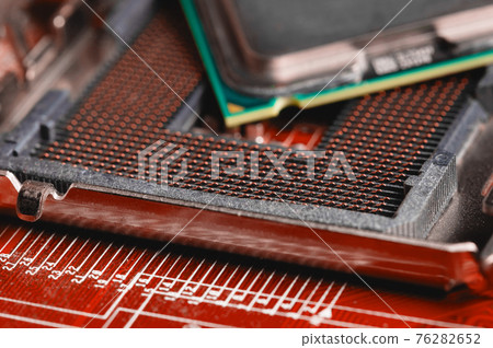 close-up of a printed circuit board with microchips and radio parts with a processor. Background for electronics 76282652
