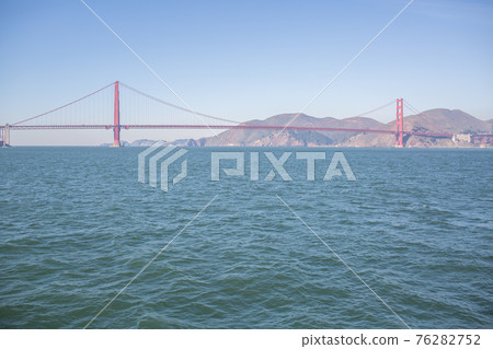 The Golden Gate Bridge as seen from a sightseeing boat in San Francisco Bay. The Golden Gate Bridge as seen from a sightseeing boat in San Francisco Bay. 76282752