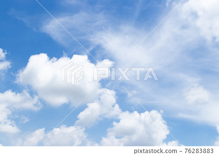 Clear blue color sky with white cloud background Clear blue color sky with white cloud background 76283883