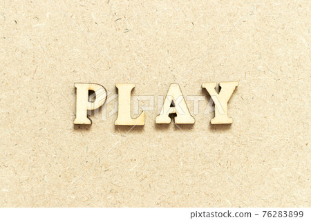 Alphabet letter in word play on wood background Alphabet letter in word play on wood background 76283899