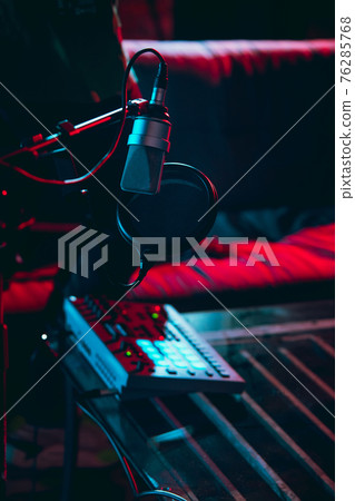 Close-up of musicial equipment for performing in neon light. Concept of advertising, hobby, music, festival, entertainment. 76285768