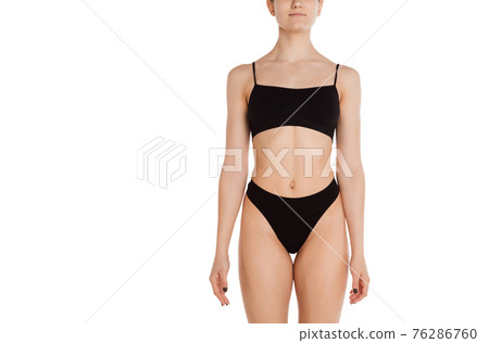 Beautiful woman wearing only black panties on white background stock photo