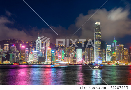 Hong Kong downtown skyline across Victoria harbor at night, Hong Kong, China. Hong Kong downtown skyline across Victoria harbor at night, Hong Kong, China. 76287355
