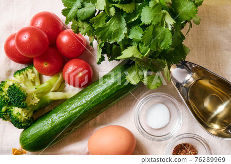 Fresh vegetables on the table for making salad Fresh vegetables on the table for making salad 76289969