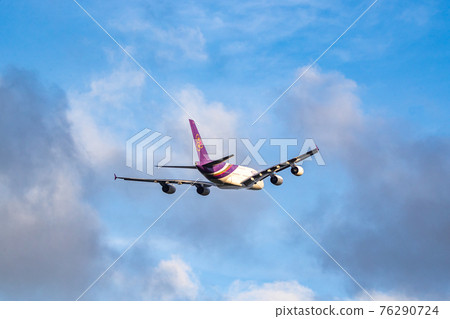 Passenger plane taking off from Narita Airport Passenger plane taking off from Narita Airport 76290724