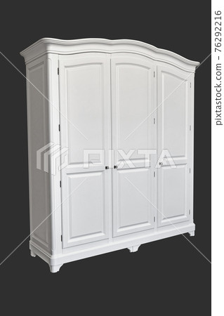 White wardrobe in classical style on grey background White wardrobe in classical style on grey background 76292216