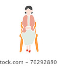 Calm woman sitting on a chair 76292880