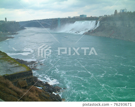 American Falls and Rainbow Bridge in the distance, Niagara Falls, Ontario, Canada 76293671