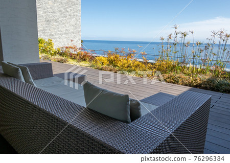 Terrace with a view of the sea Outdoor living furniture 76296384