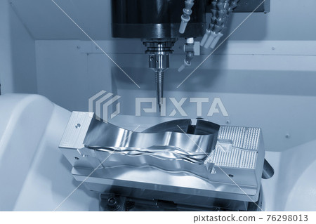 The hi-precision 5-axis machining center cutting the shoe mold parts. The hi-precision 5-axis machining center cutting the shoe mold parts. 76298013