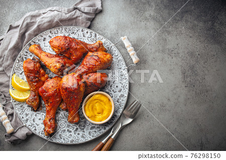 Indian food Tandoori chicken legs from above copy space Indian food Tandoori chicken legs from above copy space 76298150