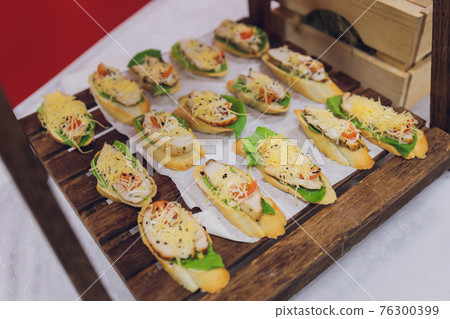 Catering service. Restaurant table with food at event. Shallow depth of view. Catering service. Restaurant table with food at event. Shallow depth of view. 76300399