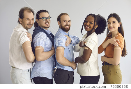 Studio group portrait of happy diverse people showing arms after getting vaccine Studio group portrait of happy diverse people showing arms after getting vaccine 76300568