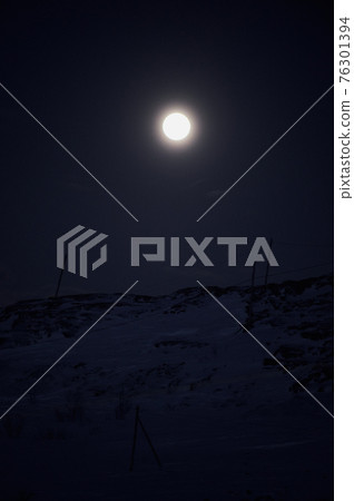 northern light on the silent field before sun rise. northern light on the silent field before sun rise. 76301394