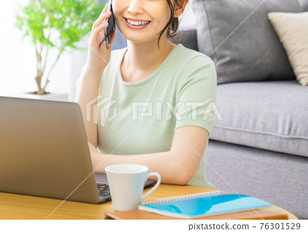 Woman doing telework at home 76301529